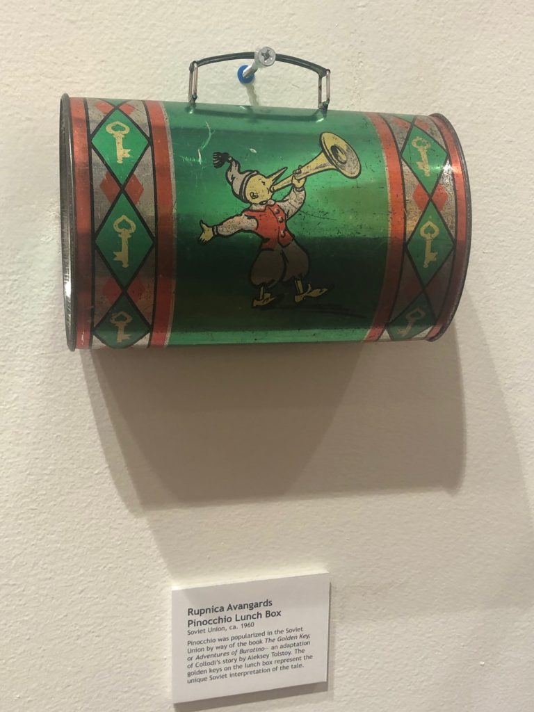 A lunchbox made in the Soviet Union with art inspired by The Golden Key, an adaptation of Pinocchio, at "A Real Boy" exhibition at Italian American Museum of Los Angeles. Photo: Liz Ohanesian