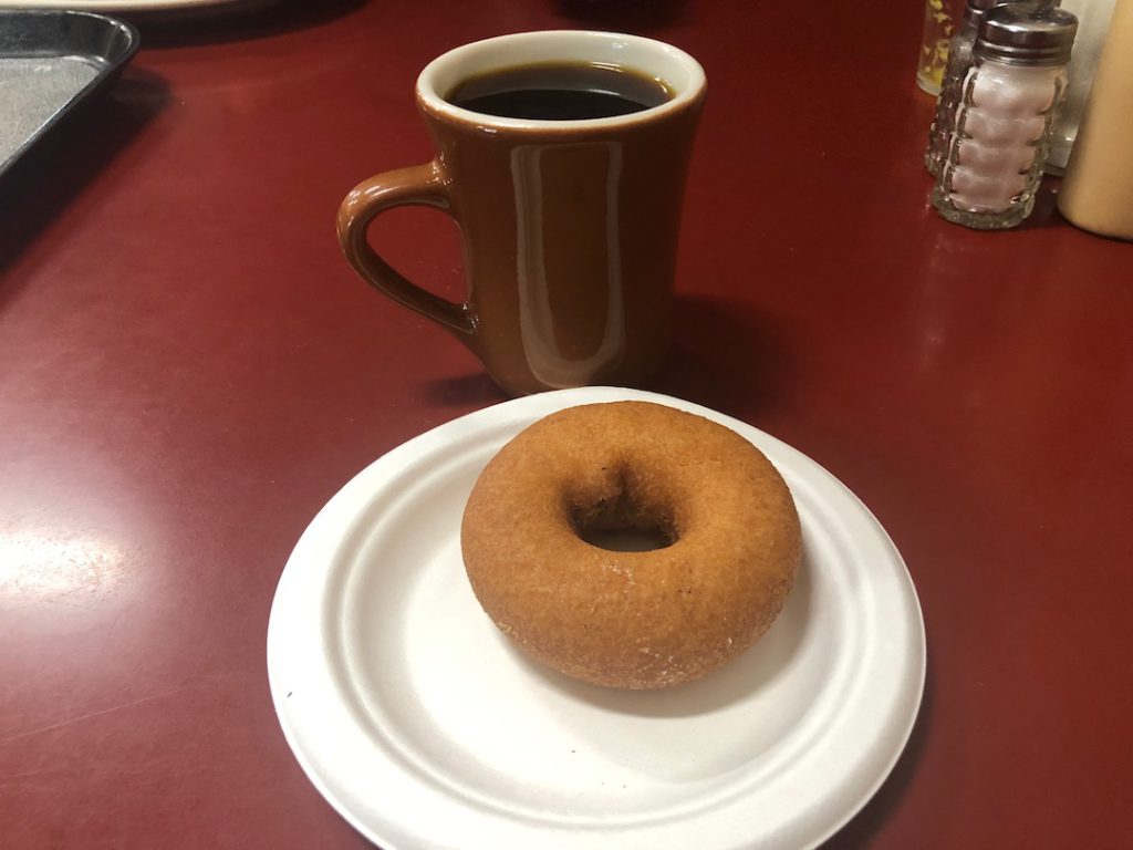 breakfast at Philippe's with a cup of coffee and a donut. Photo: Liz Ohanesian