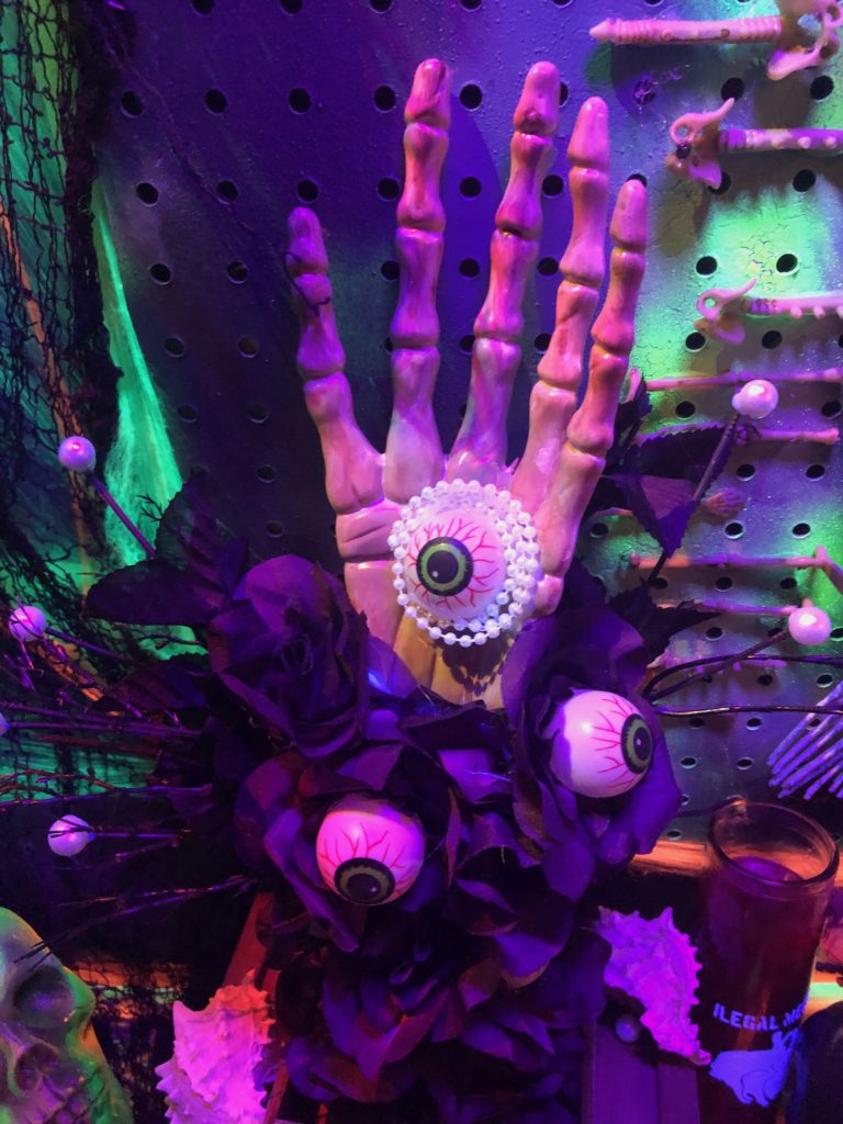 Skeleton hand with eyeball in the center is part of a Halloween display at The Mermaid in Little Tokyo, October, 2023. (Photo: Liz Ohanesian)