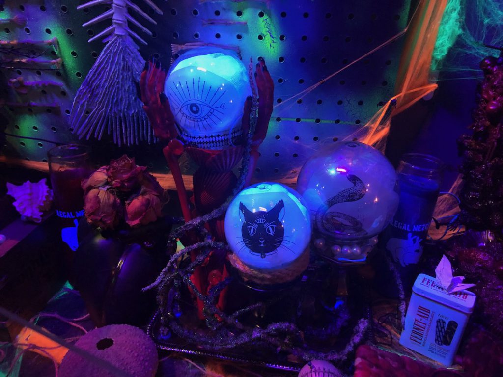 Crystal balls and other decorations at The Mermaid in Little Tokyo for Halloween, 2023. (Photo: Liz Ohanesian)