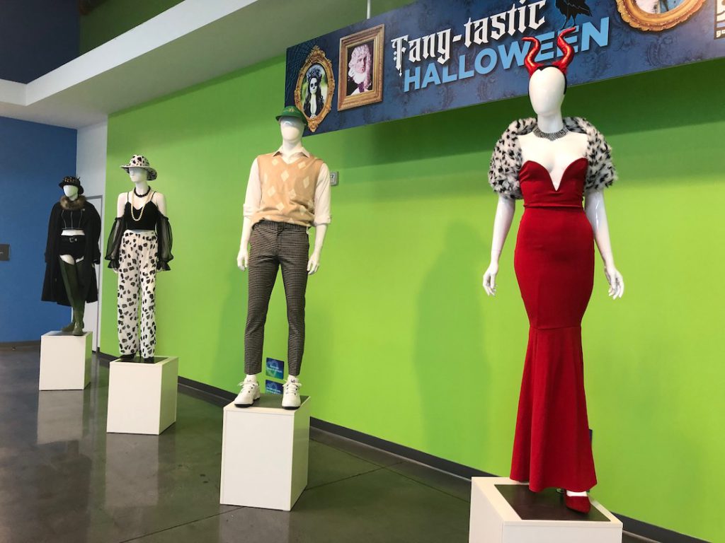 Spotted while halloween costume shopping at Goodwill Glassell Park. One mannequin dressed in a red gown, damaltian print stole and devil horns, one dressed as a golfer, one mannequin wearing cow print pants and cowboy hat, one dressed in black. (Photo: Liz Ohanesian)