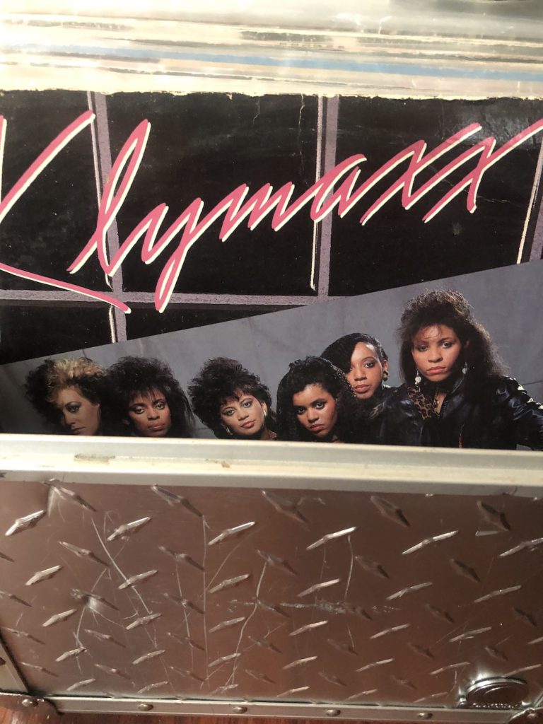 Klymaxx album Meeting in the Ladies Room on vinyl in a metal DJ crate. (Photo: Liz Ohanesian)