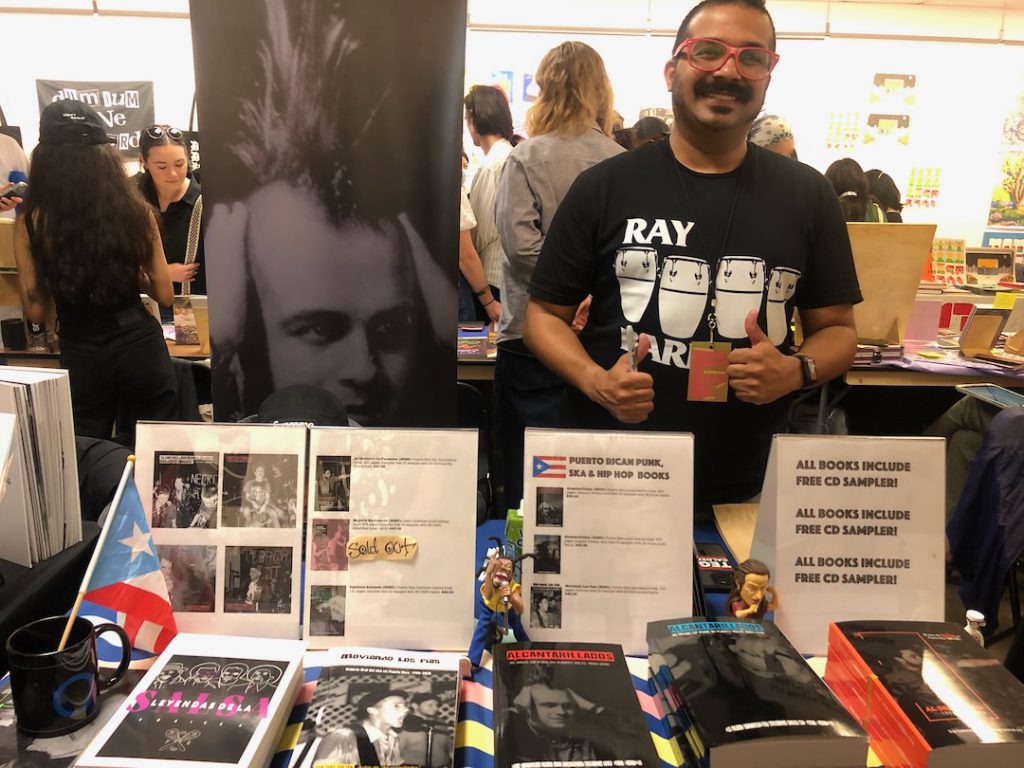 Yoel Gaetán, author of Alcantarillados: 30 Years of Punk in Puerto Rico, 1980 -2010, at Printed Matter L.A. Art Book Fair at ArtCenter in Pasadena on Sunday, May 18, 2025 (Photo: Liz Ohanesian)