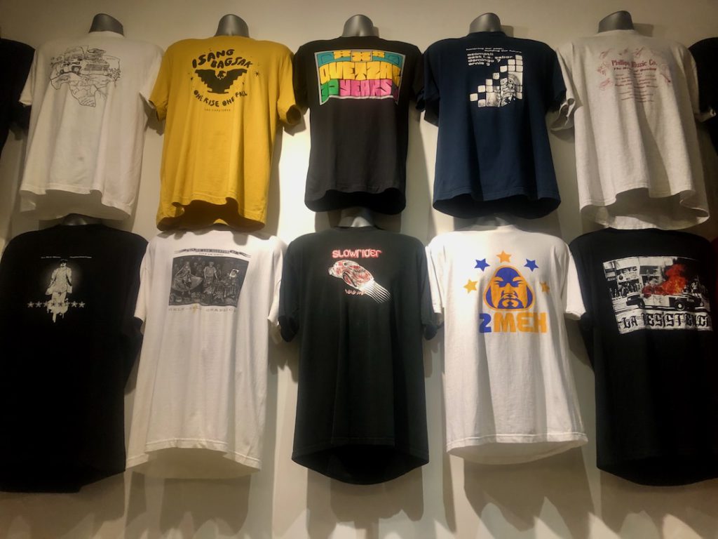 T-shirts from Quetzal, Slowrider, 2Mex and more on view at La Plaza de Cultura y Artes for exhibition "A Great Day in East L.A.: Celebrando the Eastside Sound" (Photo: Liz Ohanesian)