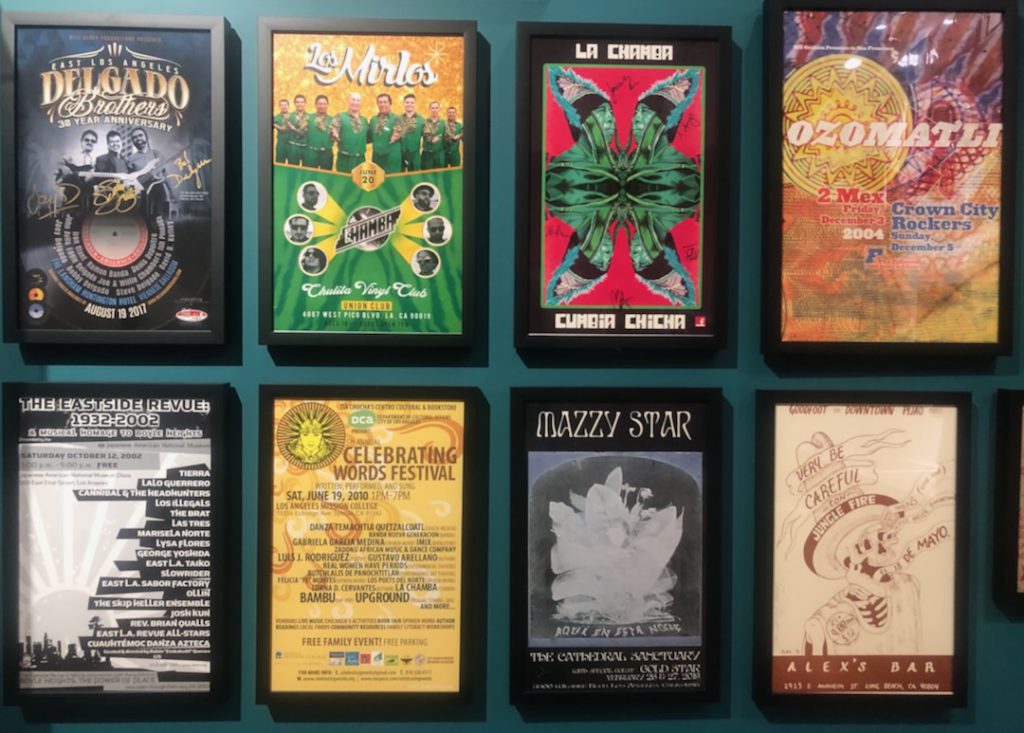 Concert posters from Los Mirlos, Mazzy Star, Ozomatli and more on view at La Plaza de Cultura y Artes for exhibition "A Great Day in East L.A.: Celebrando the Eastside Sound" (Photo: Liz Ohanesian)