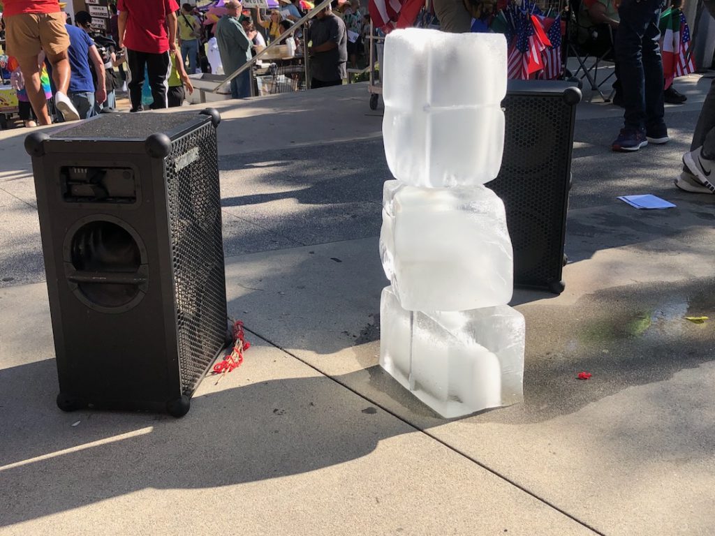 Blocks of ice melting in the sun in downtown Los Angeles at No Kings protest on October 18, 2025 (Photo: Liz Ohanesian)