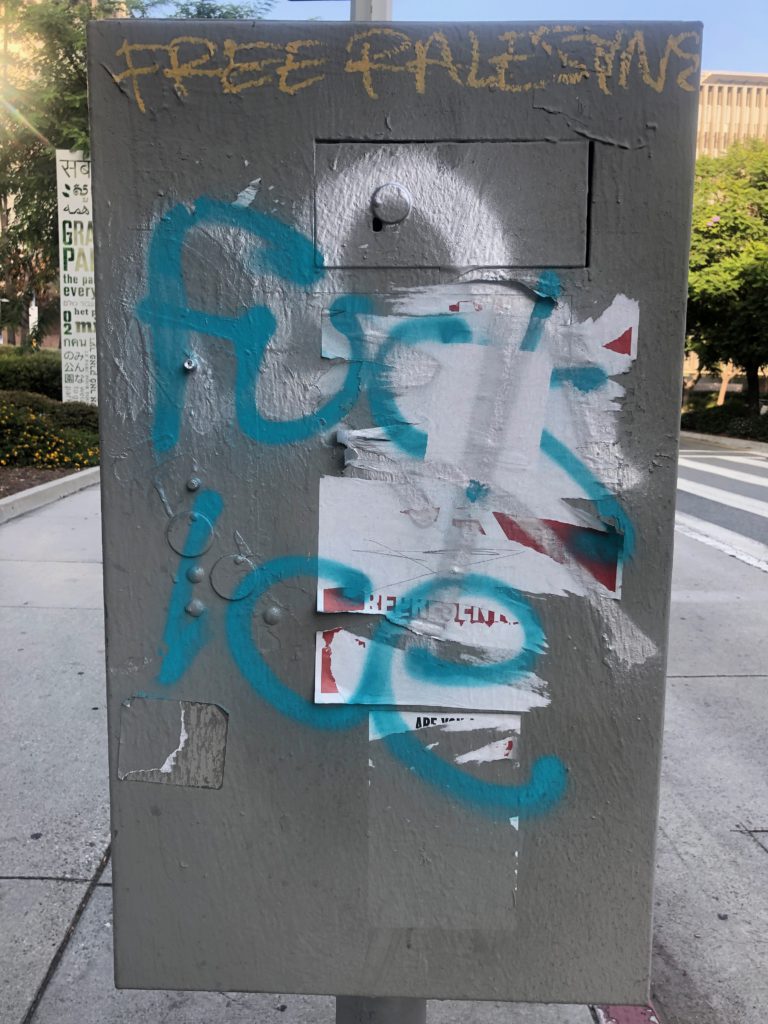 Utility box in Los Angeles with graffiti that reads "Free Palestine" on top and "Fuck ICE" in the center (Photo: Liz Ohanesian)