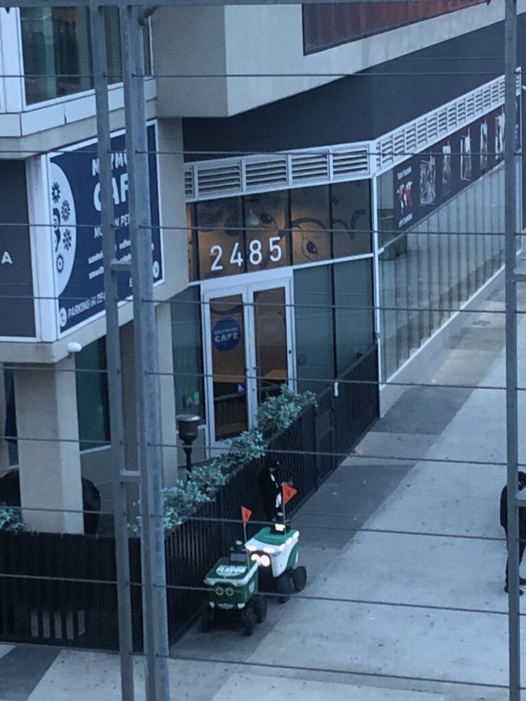 Delivery bots spotted in West Los Angeles from E Line platform (Pic: Liz Ohanesian)