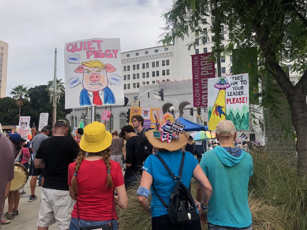 Quiet piggy sign at LA No Kings Protest 10/17/26 (Photo: Liz Ohanesian)